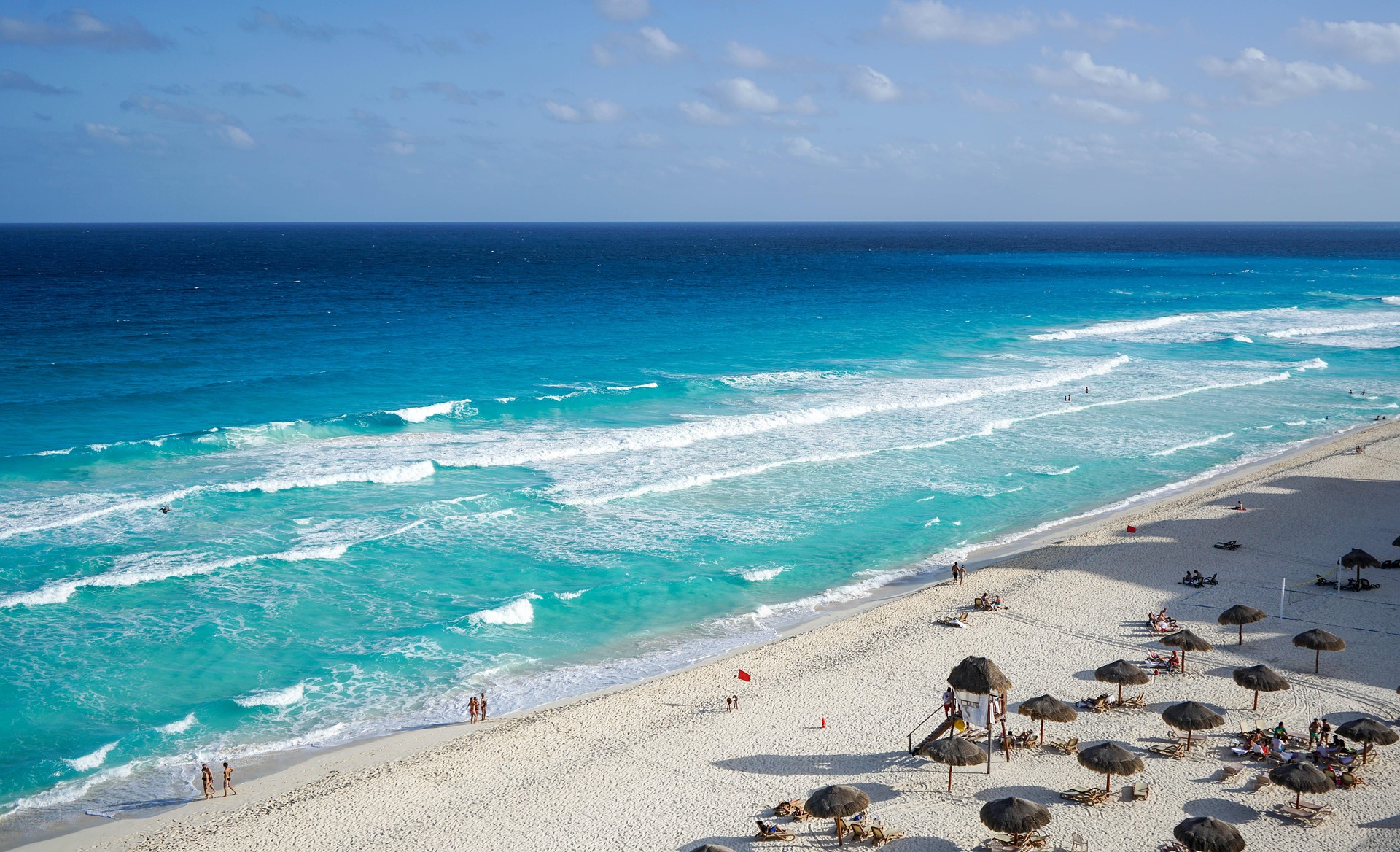 Luxury yacht charter in Cancun with crystal clear turquoise Caribbean waters and pristine coastline